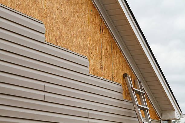 Professional Siding Contractor technician working in East Hampton, CT